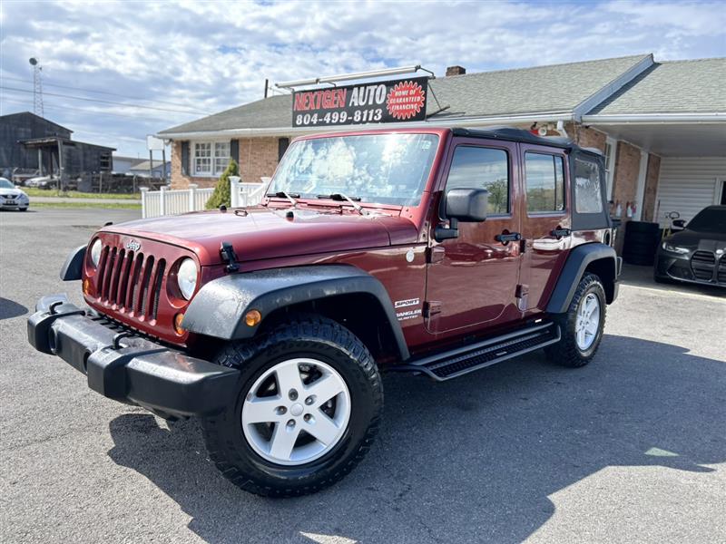 50Th Anniversary Red 2010 Jeep Wrangler Unlimited Sport 4WD SUV / Crossover Four-Wheel Drive 6-Speed Automatic